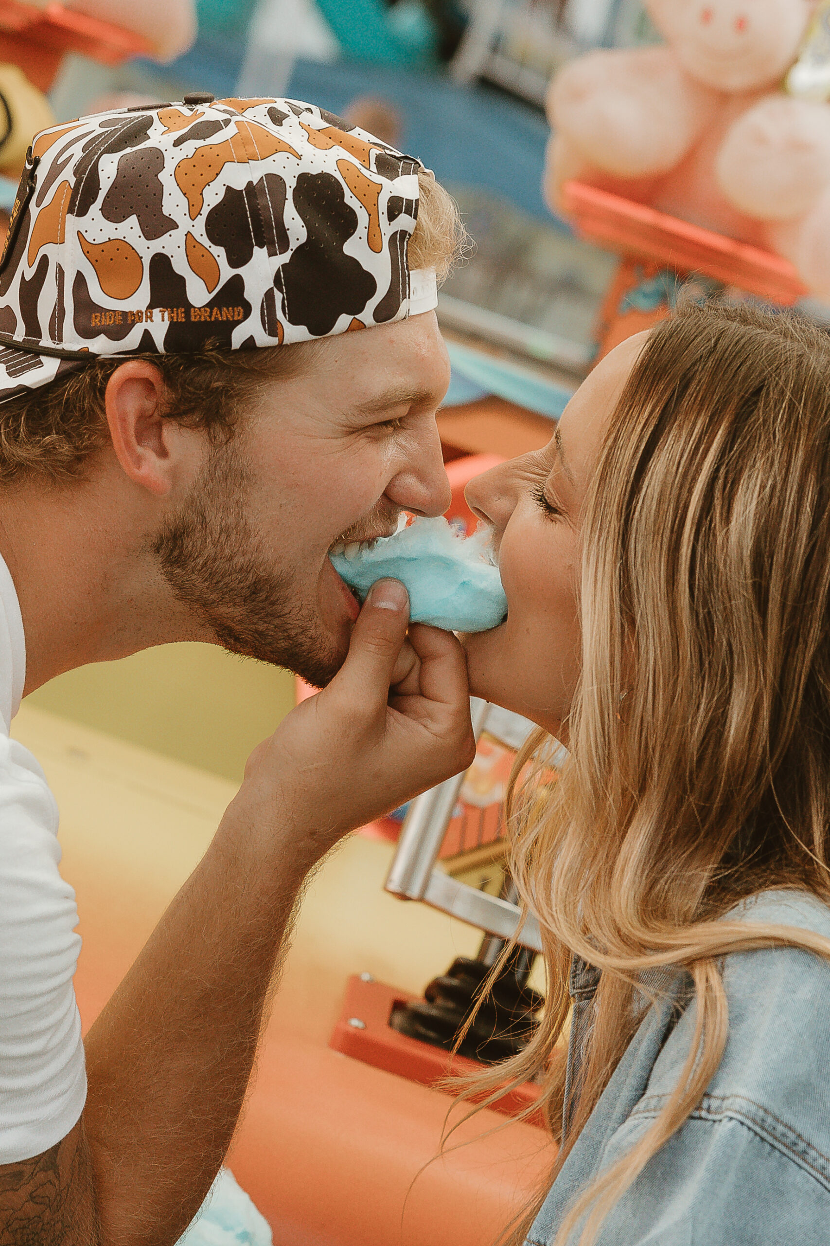 Candid couple laughing together at a Wisconsin county fair
